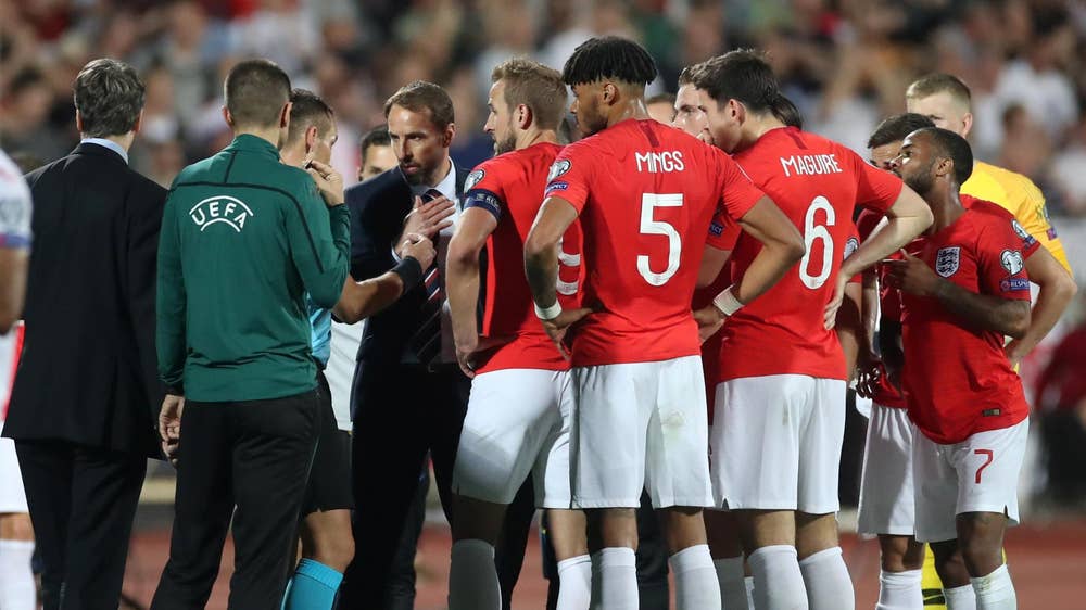 England game halted over racist abuse